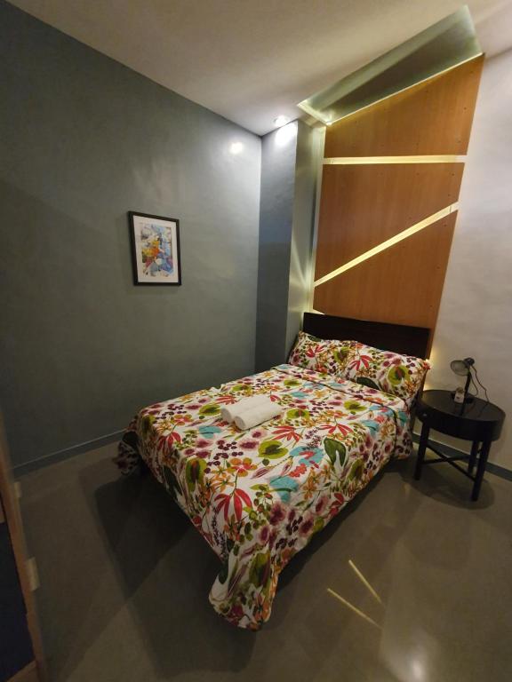 Postel nebo postele na pokoji v ubytování Felicidad Resto and Pension House