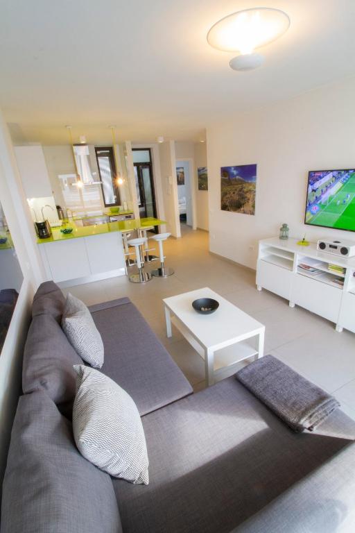 TV a/nebo společenská místnost v ubytování MEDANO4YOU The Architects Choice