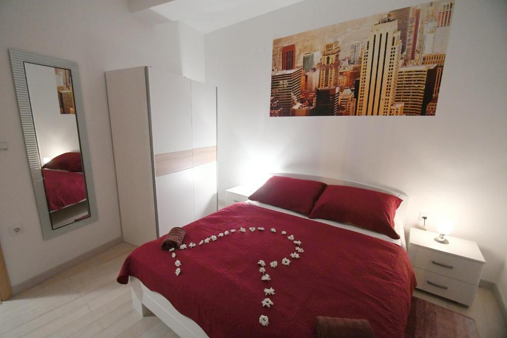 Łóżko lub łóżka w pokoju w obiekcie Apartment LIBRA with sea view