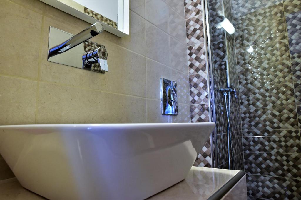 Koupelna v ubytování Kafouros Hotel