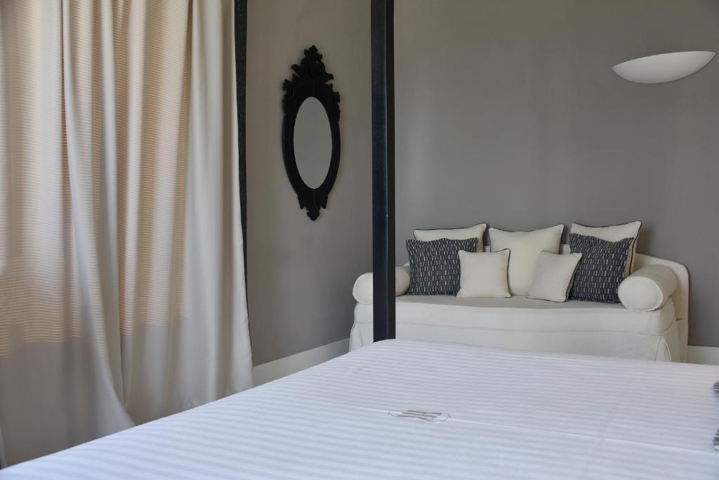 Postel nebo postele na pokoji v ubytování Hotel Ril