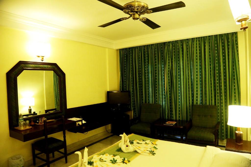 Posezení v ubytování Anandha Inn Convention Centre and Suites