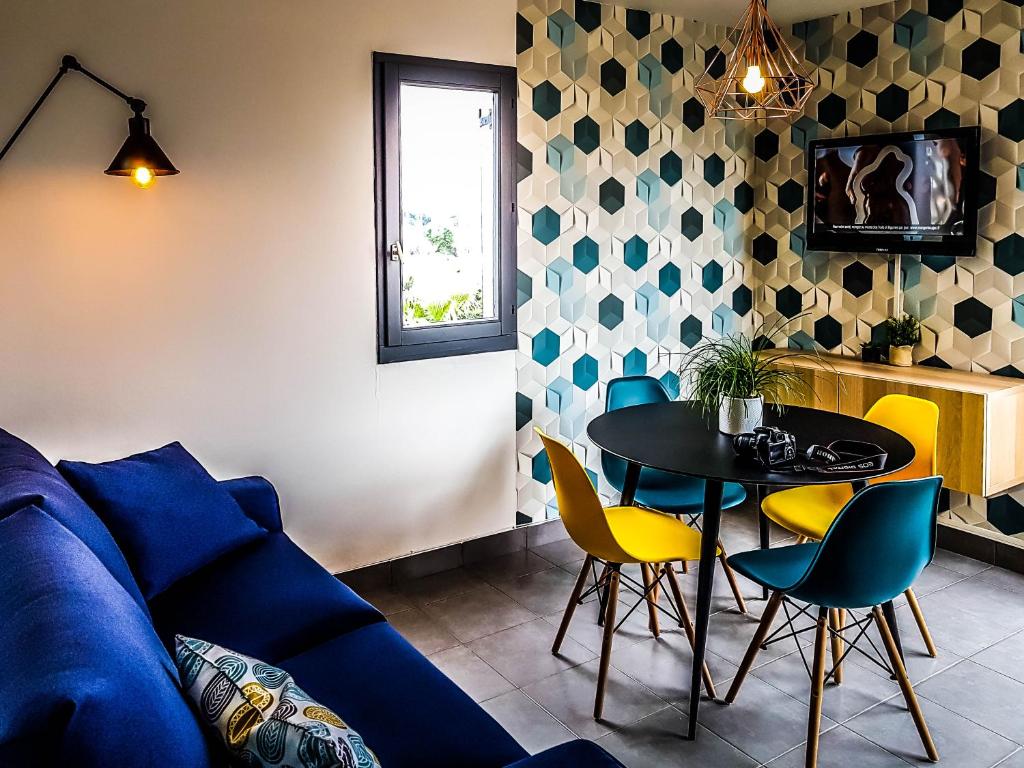 Posezení v ubytování Un petit coin de paradis