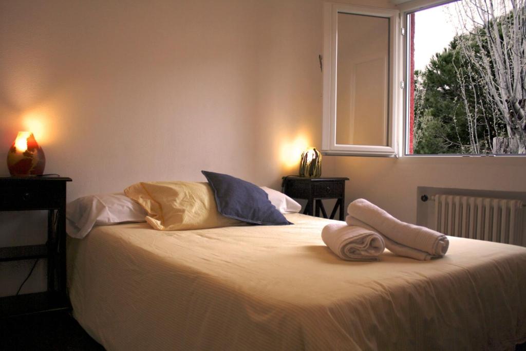 Postel nebo postele na pokoji v ubytování Piedra Libre Apartamentos