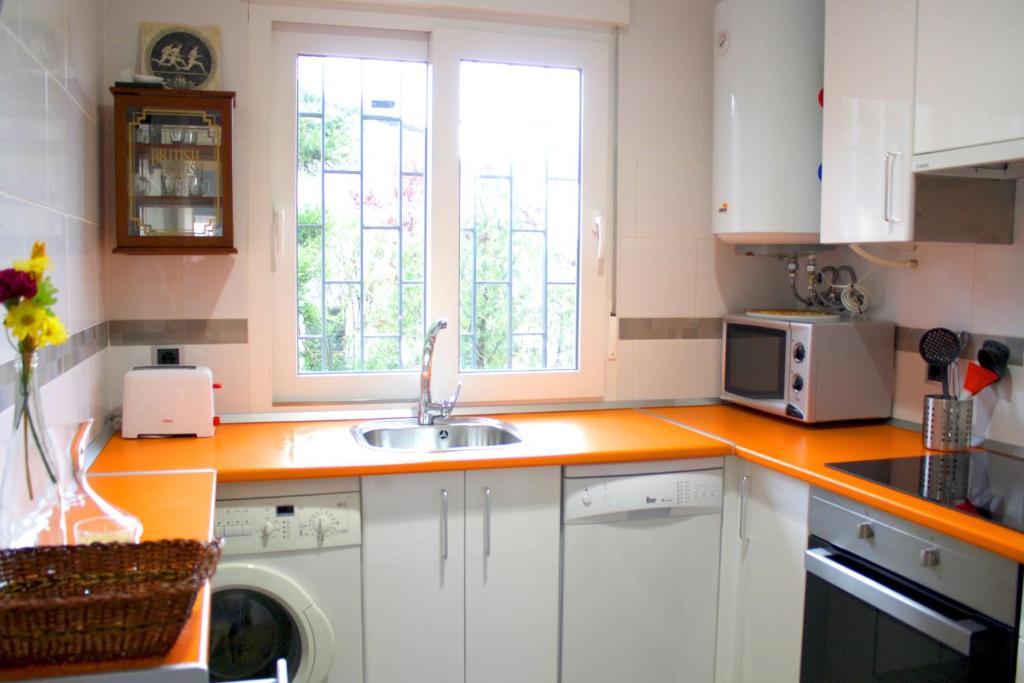 Kuchyň nebo kuchyňský kout v ubytování Piedra Libre Apartamentos
