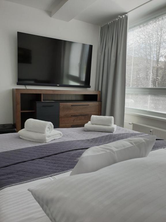 Postel nebo postele na pokoji v ubytování Apartmány Urban