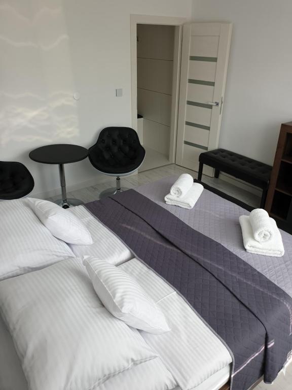 Postel nebo postele na pokoji v ubytování Apartmány Urban