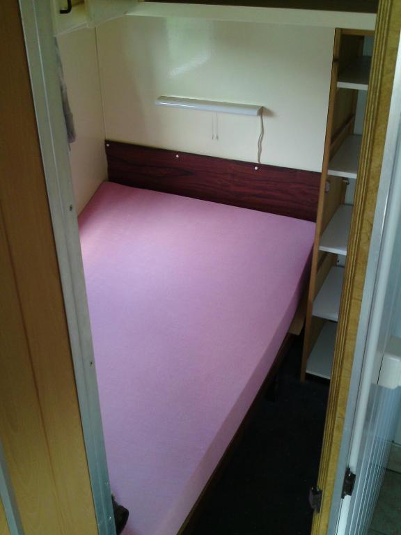 Postel nebo postele na pokoji v ubytování Dom Bursztynek - holender