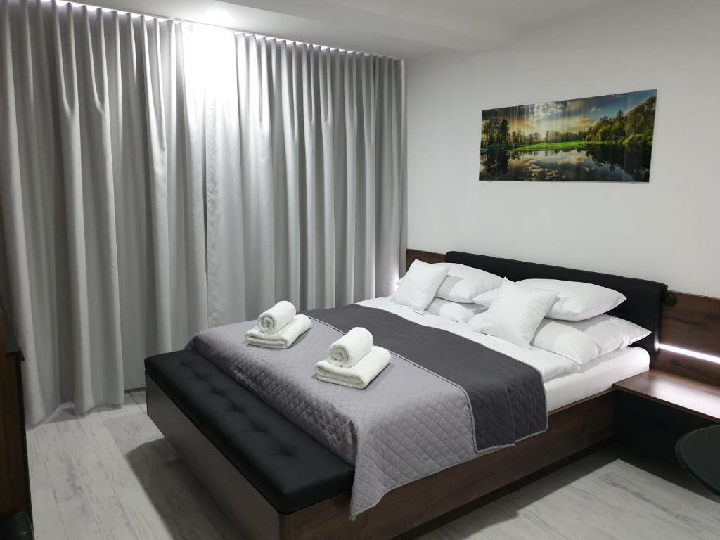 Postel nebo postele na pokoji v ubytování Apartmány Urban
