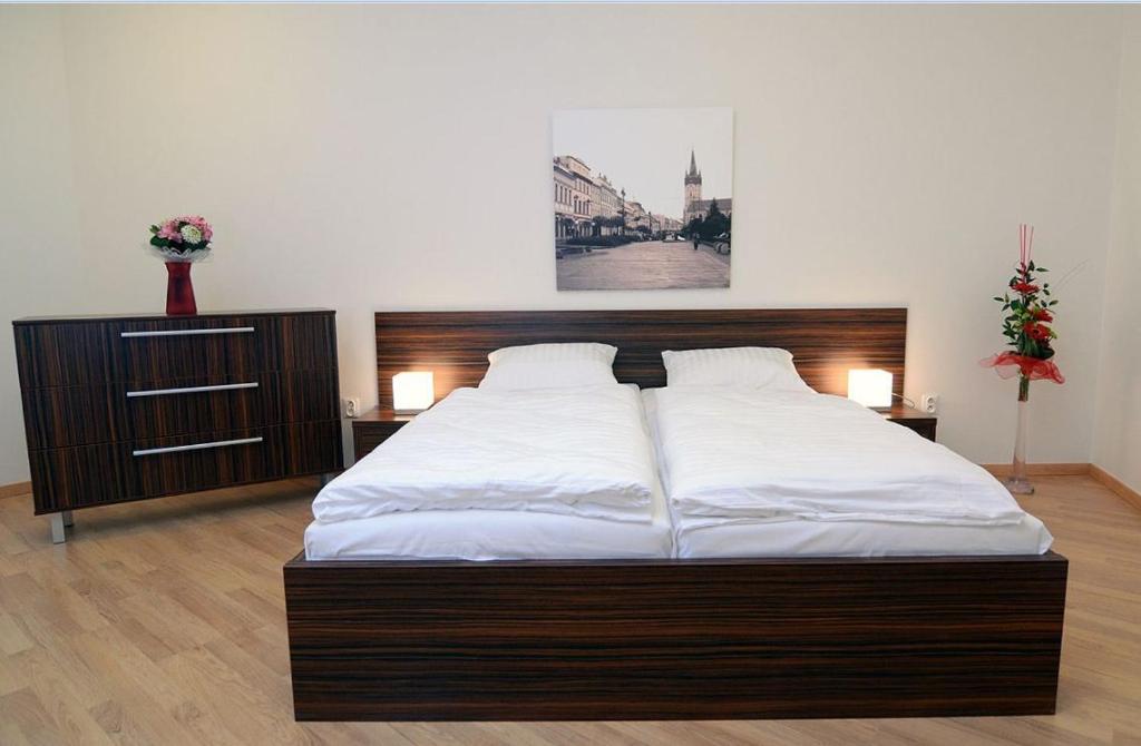 Postel nebo postele na pokoji v ubytování Hotel Bélier
