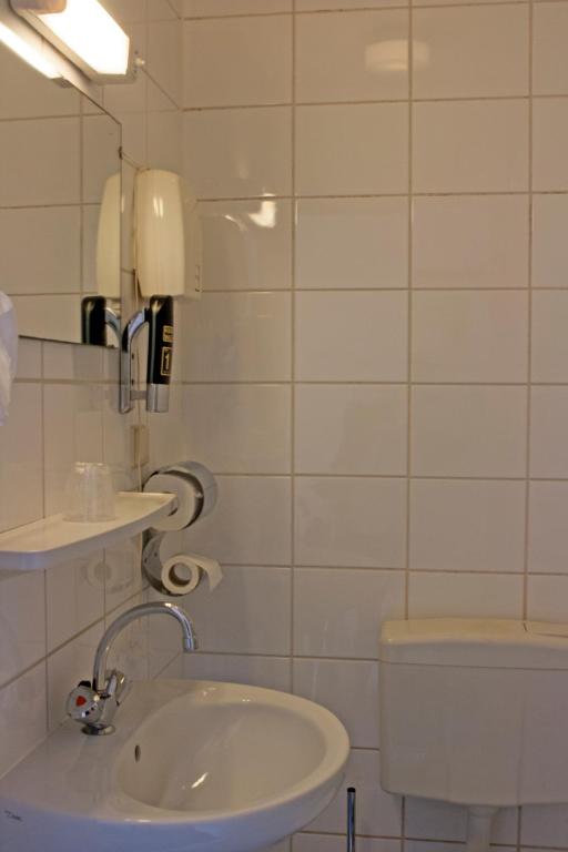 Koupelna v ubytování Koopermoolen