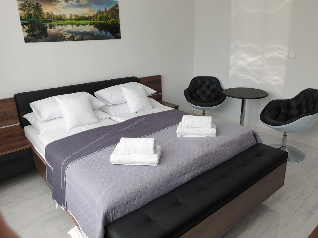 Postel nebo postele na pokoji v ubytování Apartmány Urban