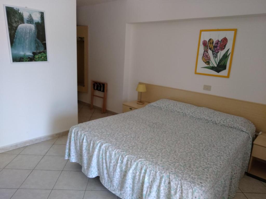 Postel nebo postele na pokoji v ubytování Villa dei Limoni