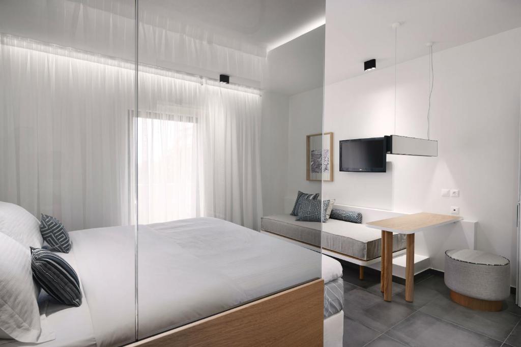 Thomais Boutique Hotelにあるベッド