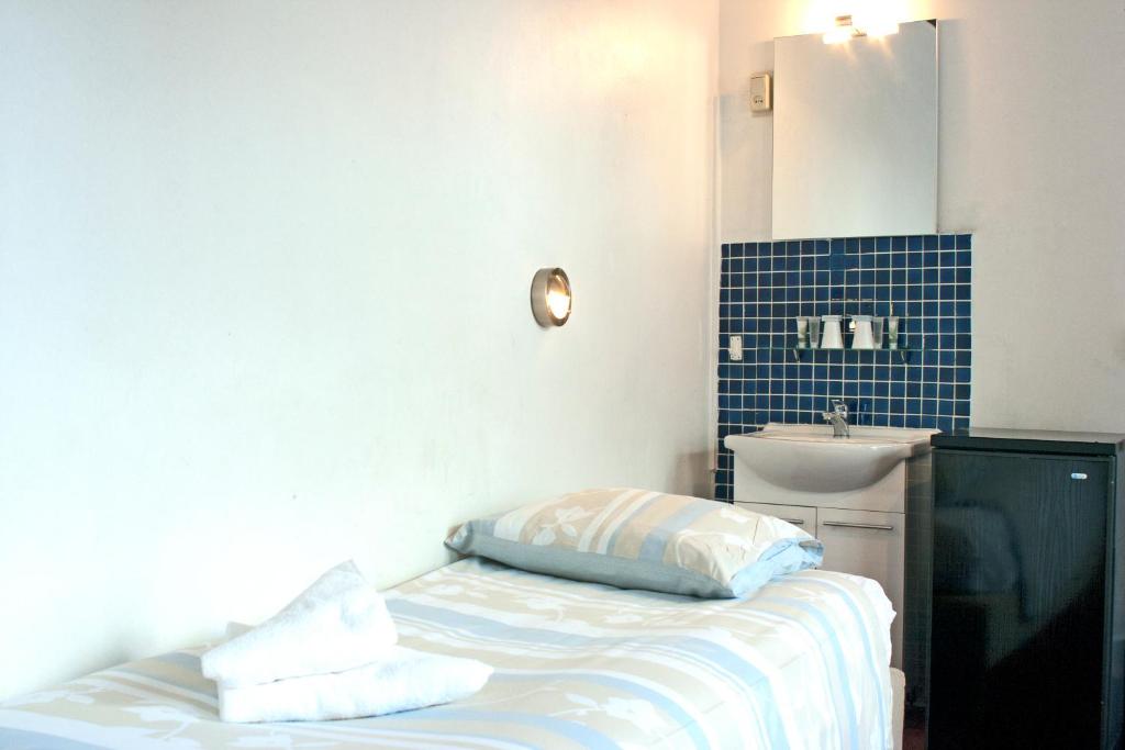 Postel nebo postele na pokoji v ubytování Hotel Torenzicht