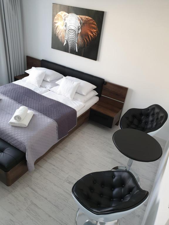 Postel nebo postele na pokoji v ubytování Apartmány Urban
