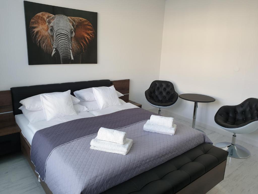 Postel nebo postele na pokoji v ubytování Apartmány Urban