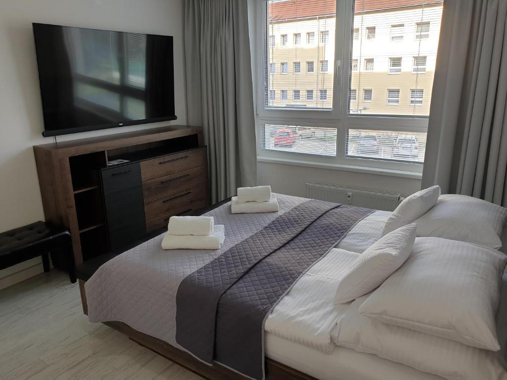 Postel nebo postele na pokoji v ubytování Apartmány Urban