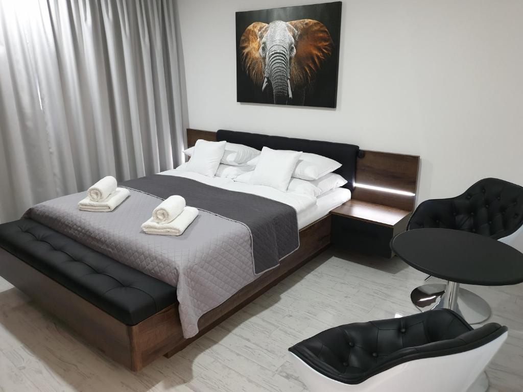 Postel nebo postele na pokoji v ubytování Apartmány Urban