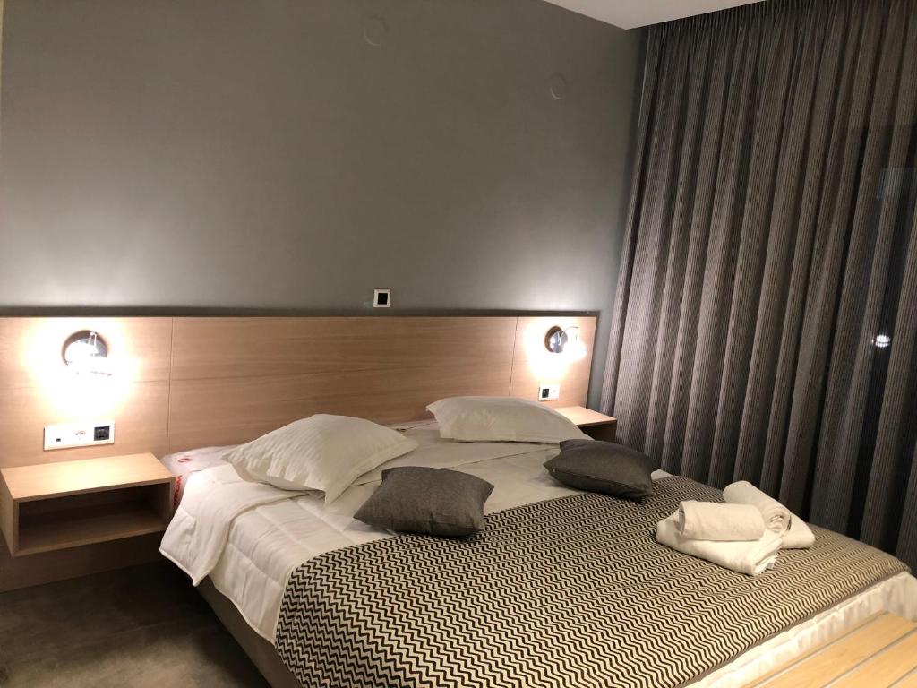 Postel nebo postele na pokoji v ubytování Filoxenia Studios