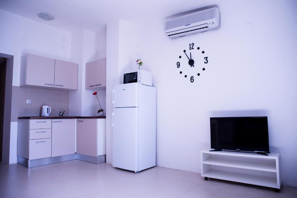 Kuchyň nebo kuchyňský kout v ubytování Apartments Svijet Mora 2