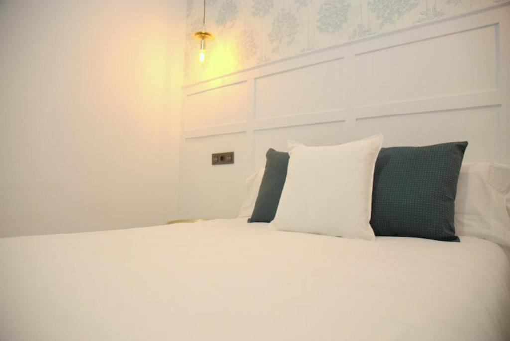 Postel nebo postele na pokoji v ubytování Hotel Cedran