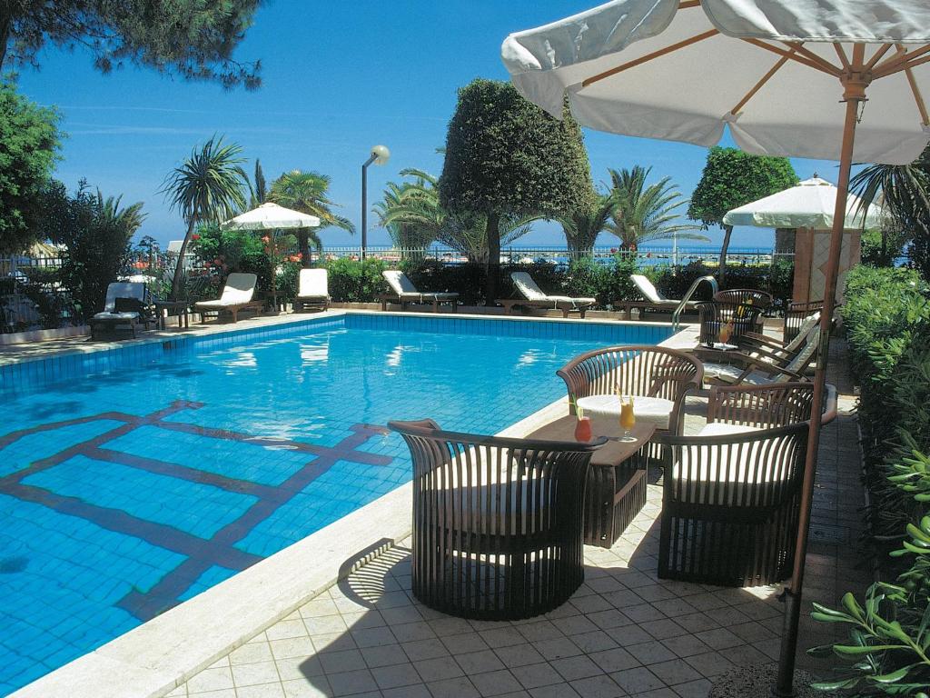 The swimming pool at or near Hotel Corallo
