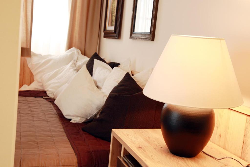 Posteľ alebo postele v izbe v ubytovaní Hotel Fahrnberger