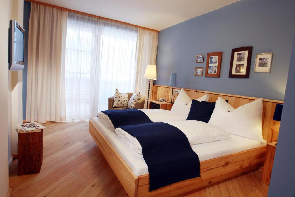 Posteľ alebo postele v izbe v ubytovaní Hotel Fahrnberger