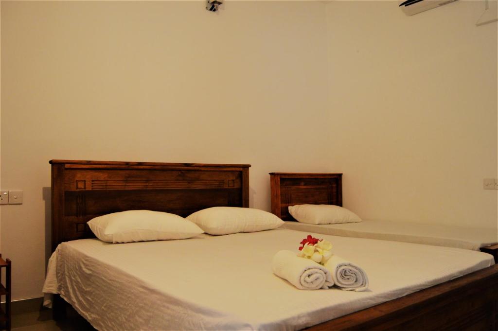 Postel nebo postele na pokoji v ubytování Shim Beach Resort
