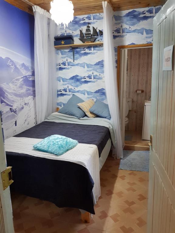 Postel nebo postele na pokoji v ubytování Sasana Motel and Guest House