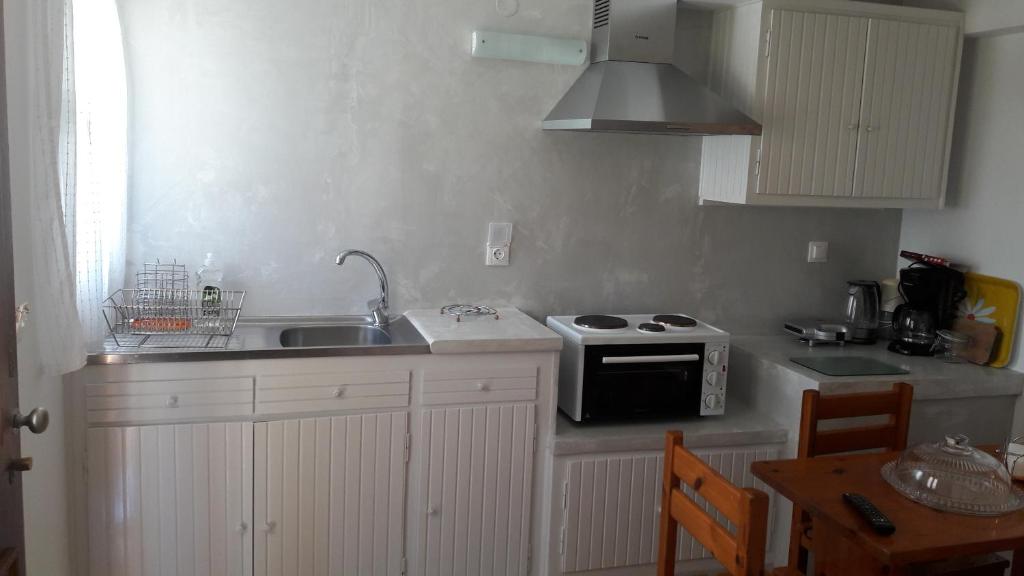 Kuchyň nebo kuchyňský kout v ubytování Ava Apartments