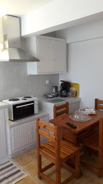 Kuchyň nebo kuchyňský kout v ubytování Ava Apartments