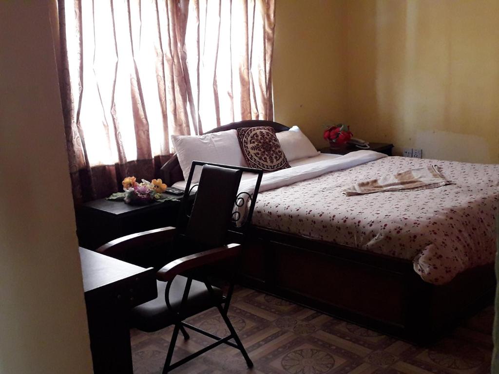 Postel nebo postele na pokoji v ubytování Hotel Vision