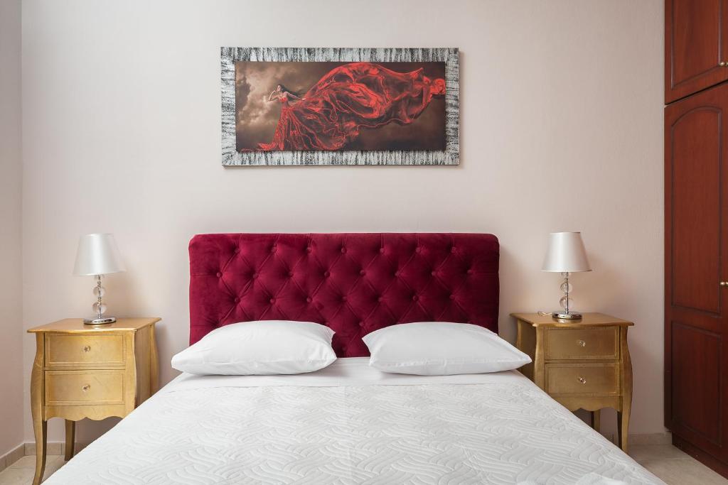 Posteľ alebo postele v izbe v ubytovaní michael apartments