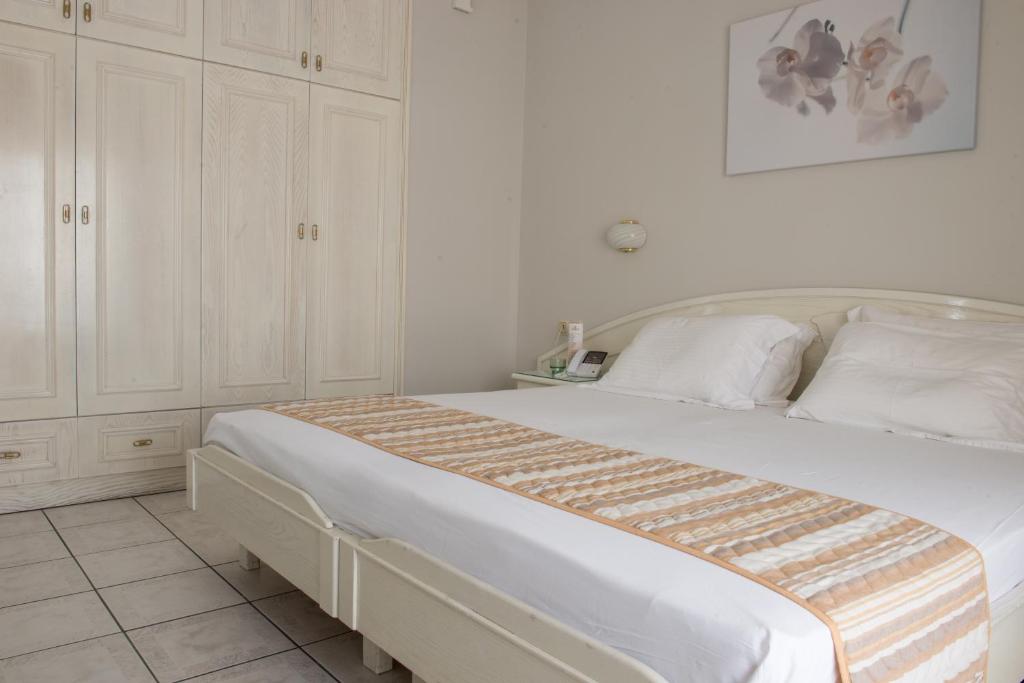 Postel nebo postele na pokoji v ubytování Hotel Strass