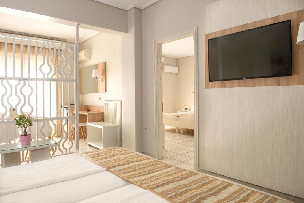 Postel nebo postele na pokoji v ubytování Hotel Strass
