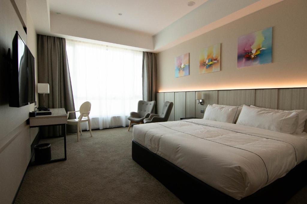 TV a/nebo společenská místnost v ubytování Higher Hotel