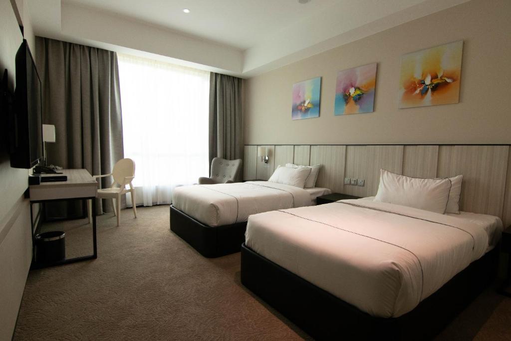Postel nebo postele na pokoji v ubytování Higher Hotel