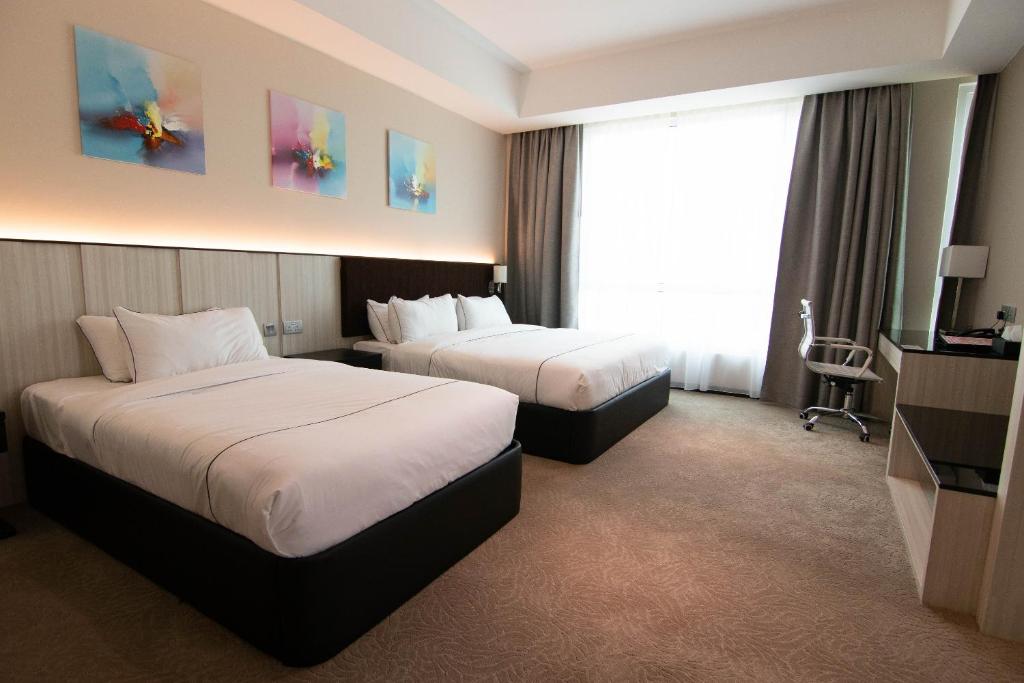 Postel nebo postele na pokoji v ubytování Higher Hotel