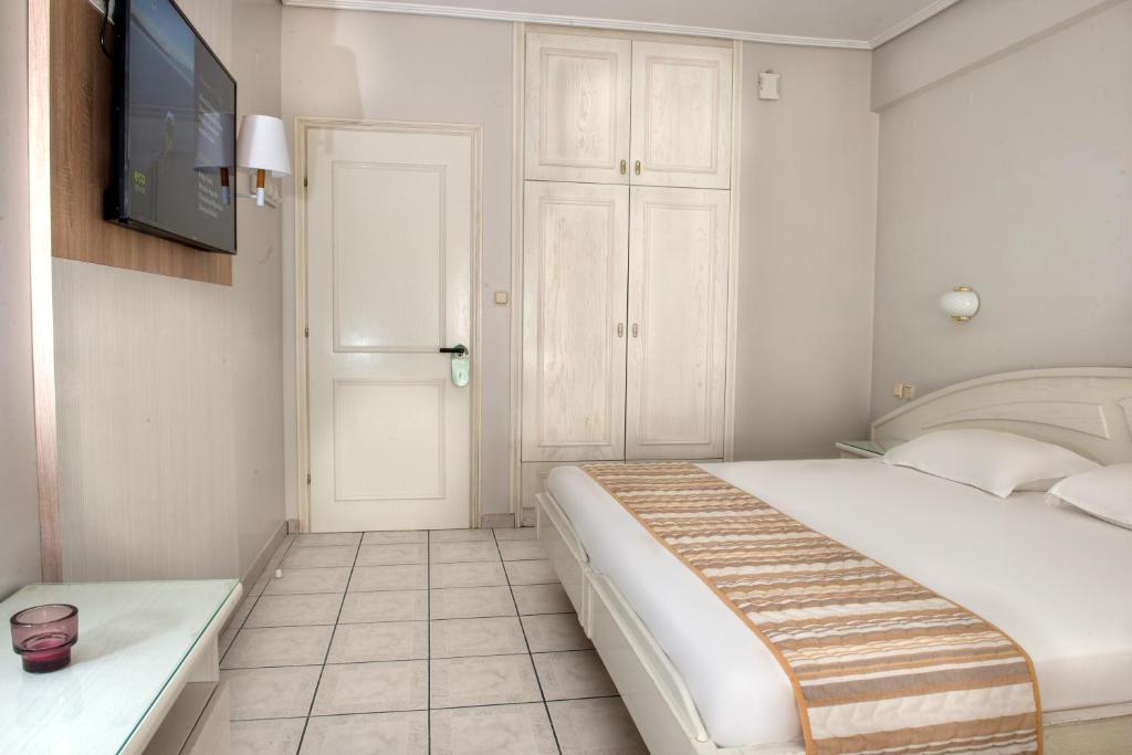 Postel nebo postele na pokoji v ubytování Hotel Strass