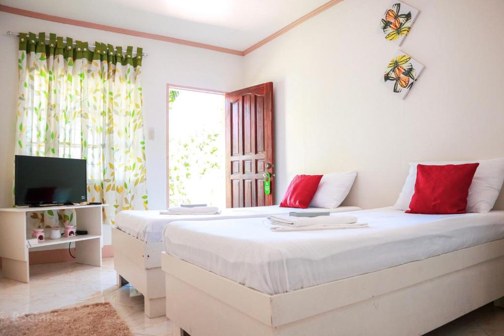 Postel nebo postele na pokoji v ubytování RQS Hostel