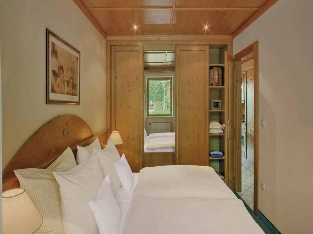 Postel nebo postele na pokoji v ubytování Apart Hotel am Sonnenhügel