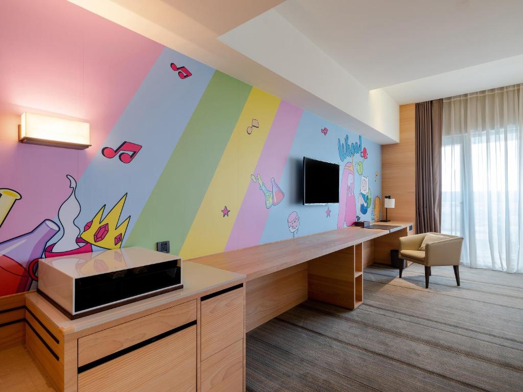 TV a/nebo společenská místnost v ubytování Hotel COZZI Ximen Tainan