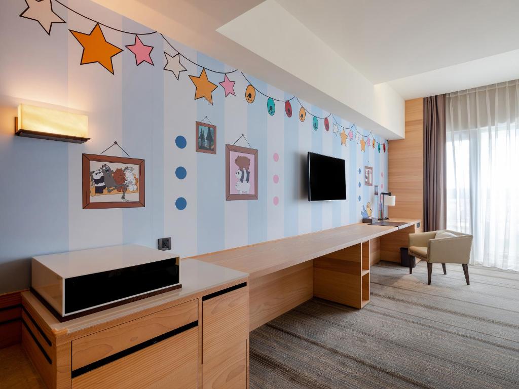 TV a/nebo společenská místnost v ubytování Hotel COZZI Ximen Tainan