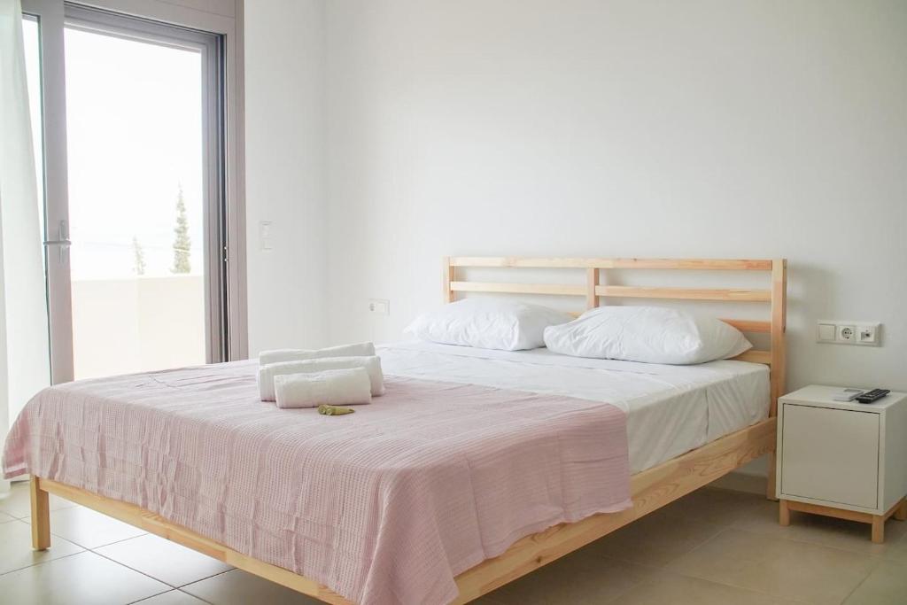 Postel nebo postele na pokoji v ubytování Legno Bianco