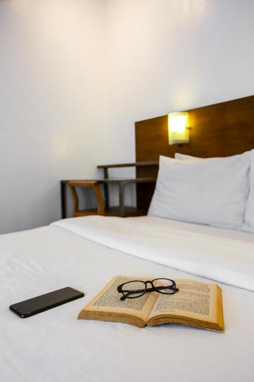 Postel nebo postele na pokoji v ubytování Hotel Durban
