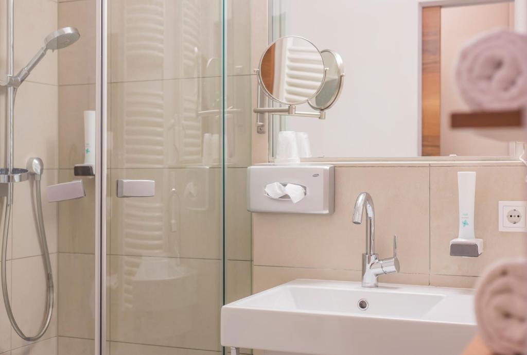 Koupelna v ubytování Hotel Bacher Asitzstubn