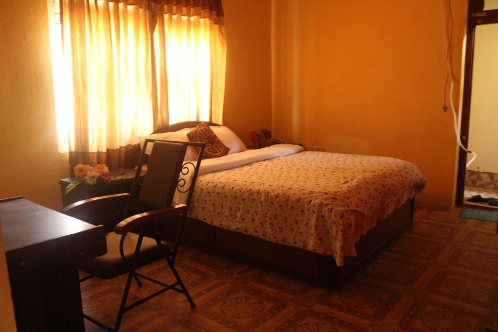 Postel nebo postele na pokoji v ubytování Hotel Vision