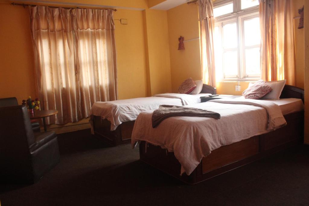 Postel nebo postele na pokoji v ubytování Hotel Vision
